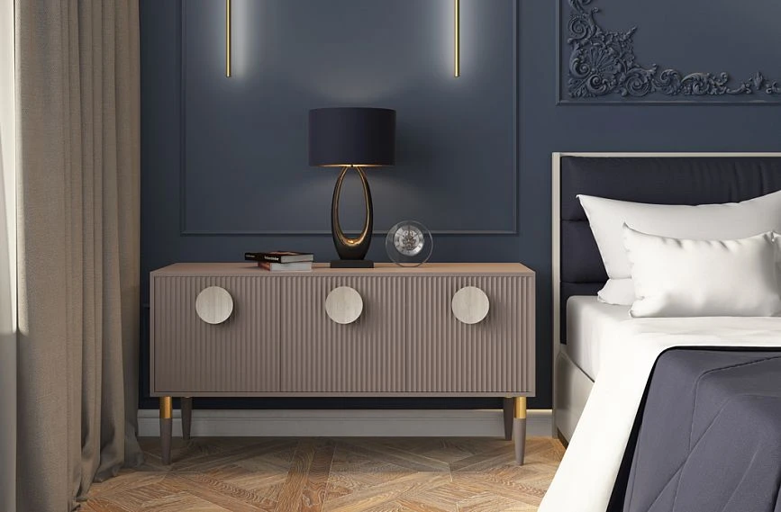 KMD-003 dresser in a modern interior with decor including carved appliqu&eacute;s, Luna furniture handles, and turned legs with metal inserts.