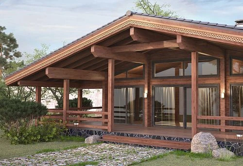 House in the style of a Russian estate with decorative elements and carvings on the facade.