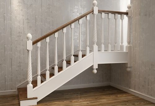 White twisted wooden column with decorative carved elements